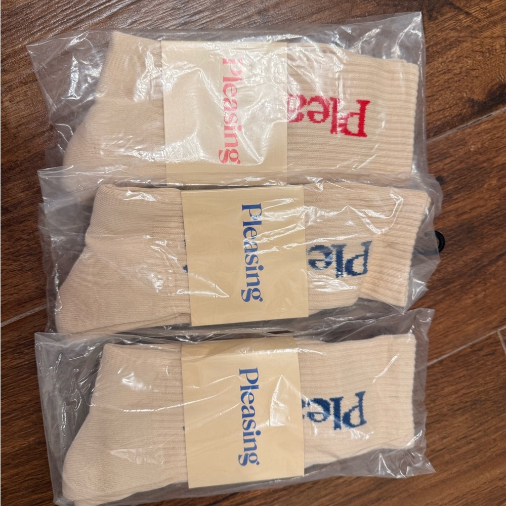 Pleasing Beige Casual Socks with Red and Blue Accents